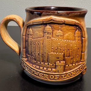 HM TOWER OF LONDON Embossed Pottery Souvenir Mug